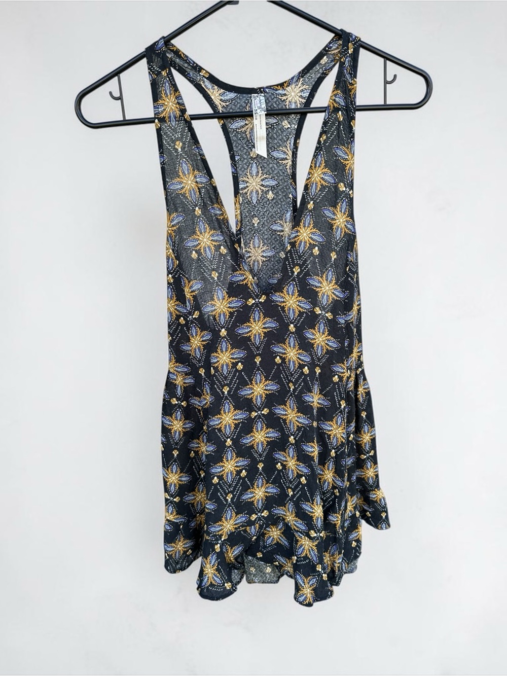 Free People Black Racerback Tank with Yellow Floral Starburst Print